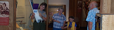 Ranger providing a guided tour of the museum